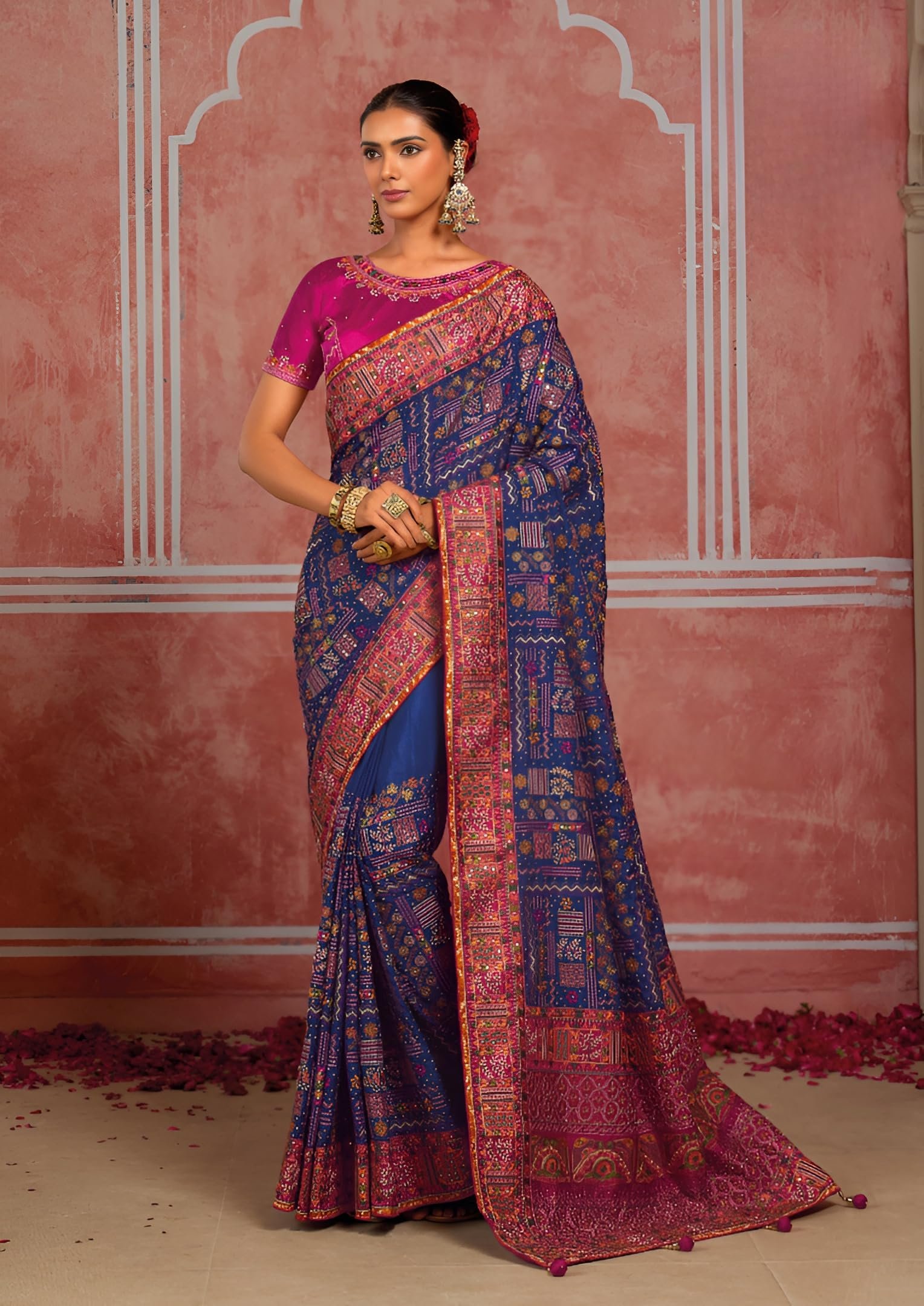 Blue Silk Saree with Pink Zari Border and Embroidered Blouse